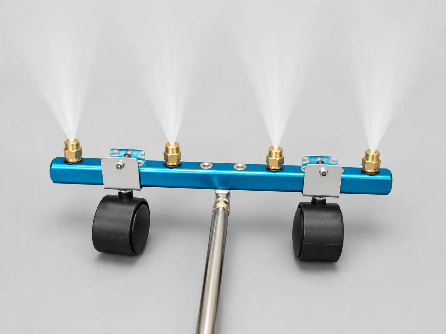 Solar Panel Cleaning System — nozzles spraying a fine fan of water